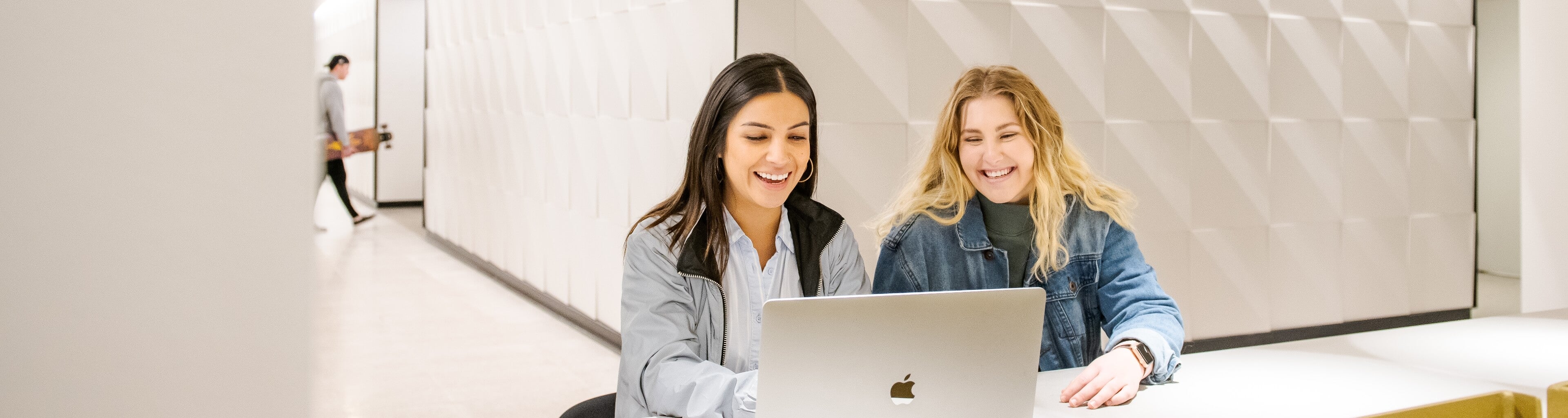 Students working together on a computer